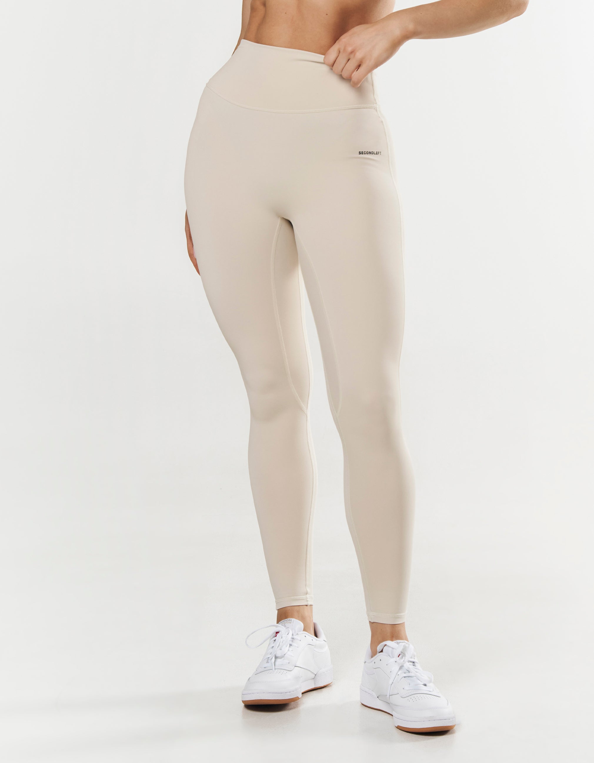 Cream hotsell nike leggings